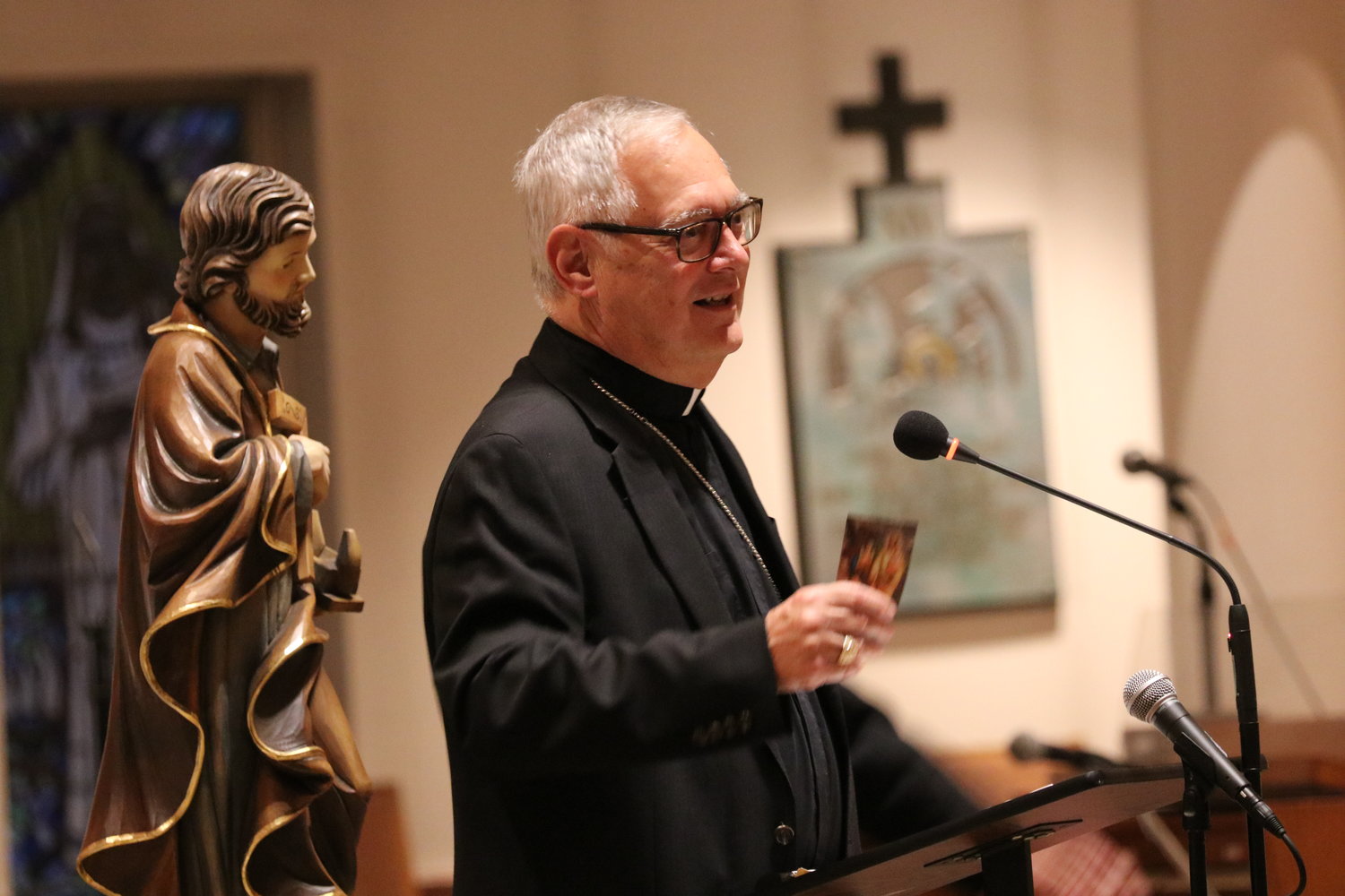 Bishop Thomas J. Tobin introduces Mike Aquilina, an author of works on St. Joseph, who spoke in the second event in the sesquicentennial celebration of the diocese.